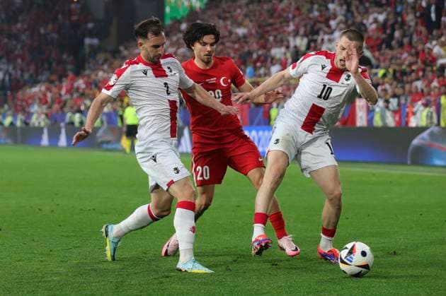 Turkey v Georgia UEFA EURO, EM, Europameisterschaft,Fussball 2024 Group F Otar Kakabadze of Georgia, Ferdi KadÄ±oÄülu of Turkeya and Giorgi Chakvetadze of Georgia in action during the UEFA Euro 2024 Group F match between Turkey and Georgia at Signal Iduna Park, Dortmund Copyright: xPaulxChestertonx FIL-20283-0269 UK Newspapers OUT