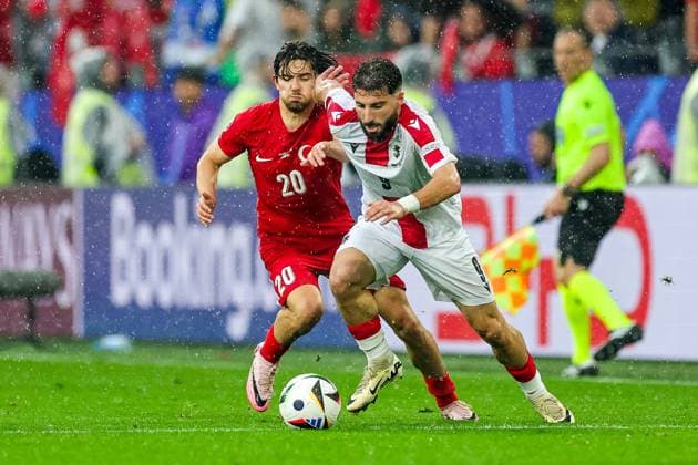 Turkey v Georgia Euro 2024 18 06 2024. Group F Zuriko Davitashvili of Georgia holds off Ferdi KadÄ±oglu of Turkey during the Euro 2024 match between Turkey and Georgia at BVB Stadion, Dortmund, Germany on 18 June 2024. Editorial use only , Copyright: xNigelxKeenex PSI-19820-0088