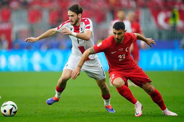 GER: Turkiye v Georgia. UEFA EURO, EM, Europameisterschaft,Fussball 2024 Khvicha Kvaratskhelia of Georgia and Kaan Ayhan of Turkiye during the UEFA Euro 2024 match between Turkiye and Georgia, Group F, date 1, played at BVB Stadion on June 18, 2024 in Dortmund, Germany. kpng Copyright: xSergioxRuizx xPRESSINPHOTOx PS_240618_TUR_GER_045