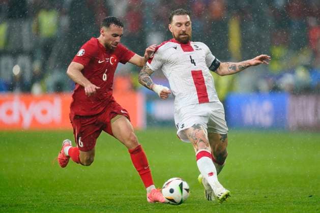 GER: Turkiye v Georgia. UEFA EURO, EM, Europameisterschaft,Fussball 2024 Guram Kashia of Georgia and Orkun Kokcu of Turkiye during the UEFA Euro 2024 match between Turkiye and Georgia, Group F, date 1, played at BVB Stadion on June 18, 2024 in Dortmund, Germany. kpng Copyright: xSergioxRuizx xPRESSINPHOTOx PS_240618_TUR_GER_140