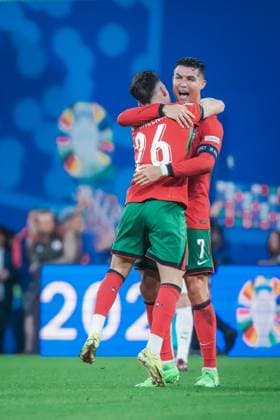 EURO 2024 - Matchday 1, Group F: Portugal vs. Czech Republic Cristiano Ronaldo shares the joy of Portugal winning three points with youngster Francisco Conceicao after the EURO 2024 Day 1, Group F match between Portugal and Czech Republic on 18 June 2024, at Red Bull Arena, in Leipzig, Germany Leipzig Red Bull Arena Germany Copyright: xAlexandraxFechetex DSC06396