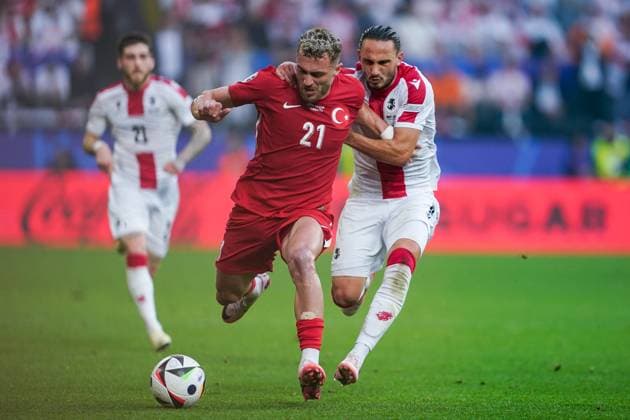 Dortmund, Germany, June 18th 2024: BarÄ±s Alper YÄ±lmaz (21 Turkey) and Giorgi Kochorashvili (6 Georgia) battle for the ball (duel) during the UEFA EURO, EM, Europameisterschaft,Fussball 2024 Germany Group F football match between Turkiye and Georgia at BVB Stadion Dortmund in Dortmund, Germany. (Daniela Porcelli SPP) Copyright: xDanielaxPorcellix xSPPx spp-en-DaPoSp-20240618-_DP11426