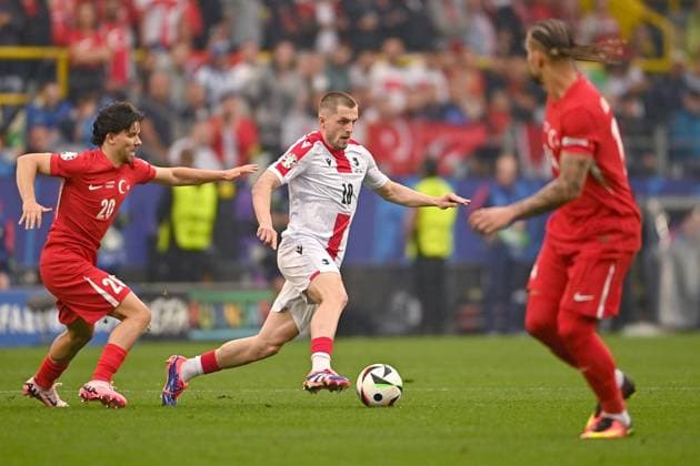 Germany Soccer Euro 2024 Turkey - Georgia 8710740 18.06.2024 Turkey s Ferdi Kadoglu anf Georgia s Giorgi Chakvetadze struggle for the ball during the UEFA EURO, EM, Europameisterschaft,Fussball 2024 Group F soccer match between Turkey and Georgia at the BVB Stadion in Dortmund, Germany. Alexey Filippov Sputnik Dortmund Germany  Copyright: xAlexeyxFilippovx