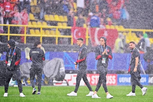 Germany Soccer Euro 2024 Turkey - Georgia 8710593 18.06.2024 Turkey s players are seen on the pitch during heavy rain ahead of the UEFA EURO, EM, Europameisterschaft,Fussball 2024 Group F soccer match between Turkey and Georgia at the BVB Stadion in Dortmund, Germany. Alexey Filippov Sputnik Dortmund Germany  Copyright: xAlexeyxFilippovx