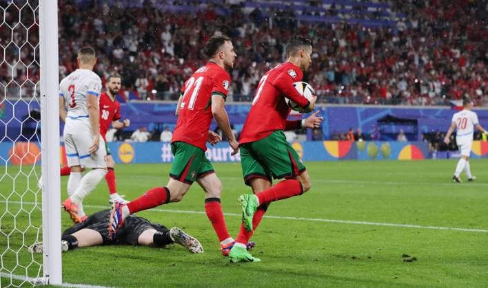 Cristiano Ronaldo retrieves ball from goal after own goal Robin Hranac to 1 1 against goalkeeper Jindrich Stanek Sport Football Soccer European Championship Euro 2024 European Championship Men Season 2023 2024 18 06 2024 Portugal POR vs Czech Republic CZE in Leipzig DFL regulations prohibit any use of photographs as image sequences and or quasi video