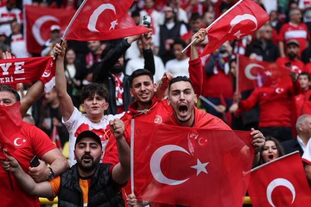 (240619) -- DORTMUND, June 19, 2024 -- Fans of team Turkiye cheer in the stands during the UEFA EURO, EM, Europameisterschaft,Fussball 2024 Group F match between Turkiye and Georgia in Dortmund, Germany on June 18, 2024. ) (SP)GERMANY-DORTMUND-FOOTBALL-EURO 2024-T?RKIYE VS GEORGIA PanxYulong 
