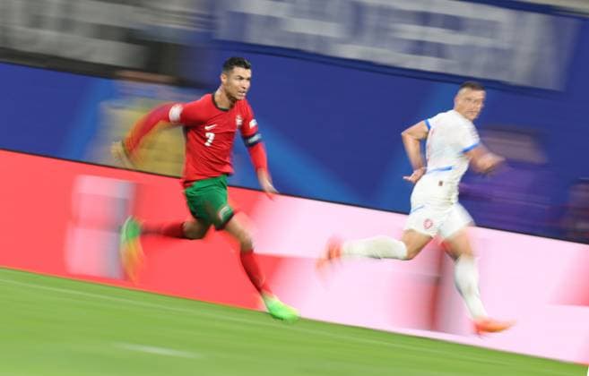 (240619) -- LEIPZIG, June 19, 2024 -- Cristiano Ronaldo (L) of Portugal runs during the UEFA EURO, EM, Europameisterschaft,Fussball 2024 Group F match between Portugal and the Czech Republic in Leipzig, Germany on June 18, 2024. ) (SP)GERMANY-LEIPZIG-FOOTBALL-EURO2024-PORTUGAL VS THE CZECH REPUBLIC BaixXuefei 
