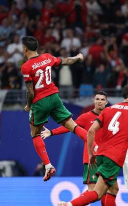 (240619) -- LEIPZIG, June 19, 2024 -- Joao Cancelo (L) of Portugal celebrates during the UEFA EURO, EM, Europameisterschaft,Fussball 2024 Group F match between Portugal and the Czech Republic in Leipzig, Germany on June 18, 2024. ) (SP)GERMANY-LEIPZIG-FOOTBALL-EURO2024-PORTUGAL VS THE CZECH REPUBLIC BaixXuefei 