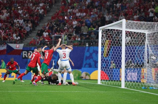 (240619) -- LEIPZIG, June 19, 2024 -- Players of Portugal celebrate an own goal by Robin Hranac of the Czech Republic during the UEFA EURO, EM, Europameisterschaft,Fussball 2024 Group F match between Portugal and the Czech Republic in Leipzig, Germany on June 18, 2024. ) (SP)GERMANY-LEIPZIG-FOOTBALL-EURO2024-PORTUGAL VS THE CZECH REPUBLIC BaixXuefei 