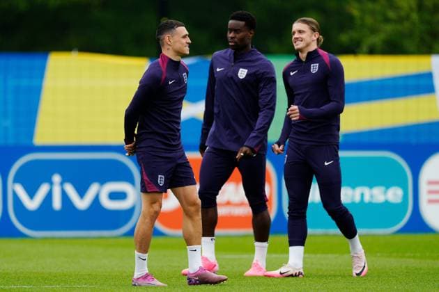 Phil Foden of England, Marc Guehi of England and Conor Gallagher of England England Training Session, UEFA European Championship, EM, Europameisterschaft 2024, Group C, Football, Spa & Golf Resort Weimarer Land, Blankenhain, Germany, 19 Jun 2024 EDITORIAL USE ONLY No use with unauthorised audio, video, data, fixture lists, club league logos or live services. Online in-match use limited to 120 images, no video emulation. No use in betting, games or single club league player publications.  Copyright: xDavexShopland Shutterstockx 14546613ad