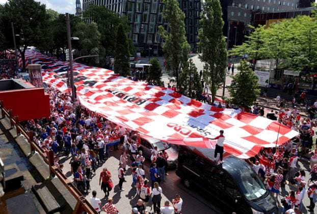 EURO 2024 Croatia Flag Croatia fans are pictured with a giant flag ahead of the UEFA EURO, EM, Europameisterschaft,Fussball 2024 Group stage match Croatia v Albania at Hamburg, Germany on June 19, 2024. The flag measures 107 by 12.5 meters and weighs 140 kilograms. SanjinxStrukic PIXSELL