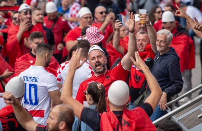 Football, men, season 2023 24, Euro 2024 Group B 2 matchday in Hamburg, Croatia Albania, Albanian fans celebrate in front of the stadium, 19 06 2024, Copyright: xSebastianxRäppold MatthiasxKochx