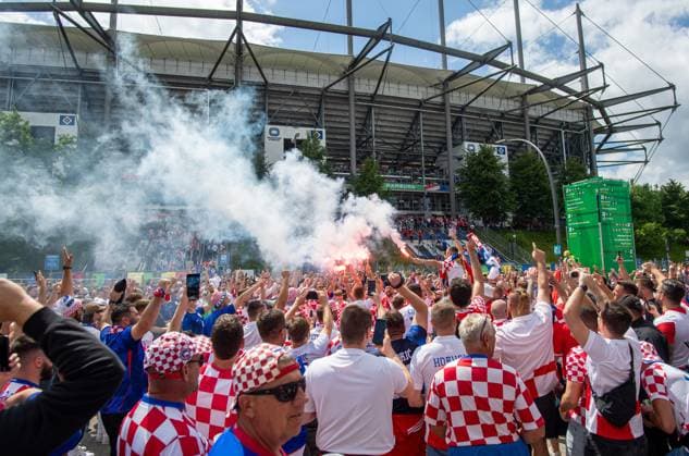 Football, men, season 2023 24, Euro 2024 Group B 2 matchday in Hamburg, Croatia Albania, Croatian fans celebrate with pyrotechnics outside the stadium, 19 06 2024, Copyright: xSebastianxRäppold MatthiasxKochx