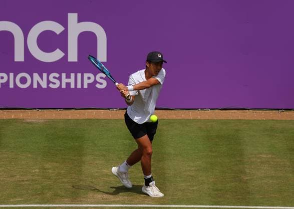 19th June 2024; Cinch Championships, Queens Club, West Kensington, London, England: Cinch Championships Queens Club, Day 3; Rinky Hijikata (AUS) with a backhand shot to Matteo Arnaldi (ITA), mens singles match  ActionPlus12656698 JohnxPatrickxFletcher