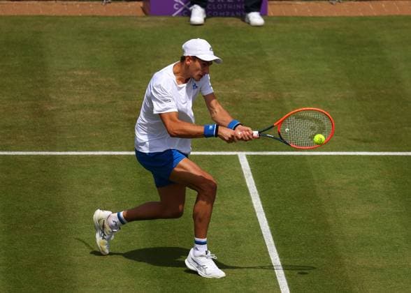 19th June 2024; Cinch Championships, Queens Club, West Kensington, London, England: Cinch Championships Queens Club, Day 3; Matteo Arnaldi (ITA) with a backhand shot to Rinky Hijikata (AUS), mens singles match  ActionPlus12656709 JohnxPatrickxFletcher