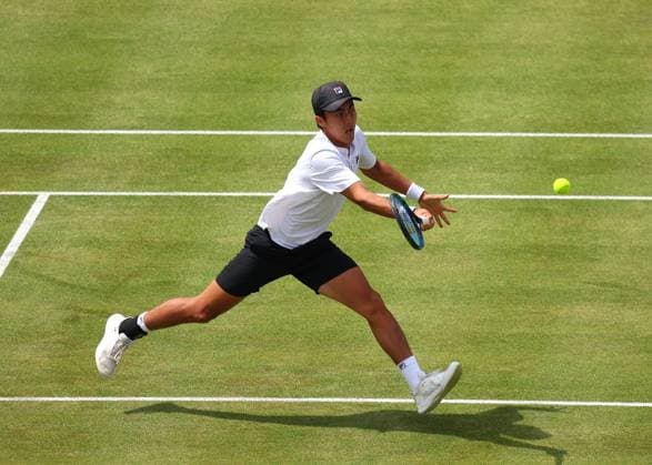 19th June 2024; Cinch Championships, Queens Club, West Kensington, London, England: Cinch Championships Queens Club, Day 3; Rinky Hijikata (AUS) with a forehand shot to Matteo Arnaldi (ITA), mens singles match  ActionPlus12656719 JohnxPatrickxFletcher