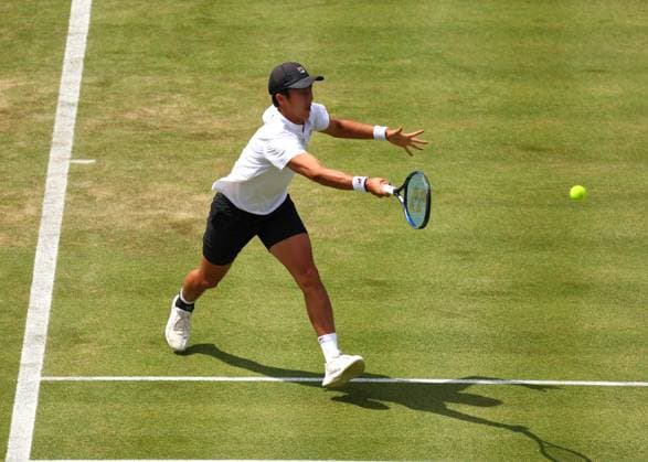 19th June 2024; Cinch Championships, Queens Club, West Kensington, London, England: Cinch Championships Queens Club, Day 3; Rinky Hijikata (AUS) with a forehand shot to Matteo Arnaldi (ITA), mens singles match  ActionPlus12656720 JohnxPatrickxFletcher