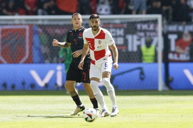 HAMBURG, Volkspark Stadium ,19-06-2024 , European Football Championship Euro2024, Group stage match no.15 between Croatia and Albania, Croatia player Josip Sutalo and Albania player Rei Manaj Croatia - Albania (Euro2024)  x25531784x Copyright: