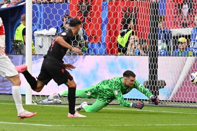 GER, Euro 2024, Group B, Croatia HRV vs Albania ALB 19 06 2024, Volksparkstadion, GER, Euro 2024, Group B, Croatia HRV vs Albania ALB in picture Qazim Laçi ALB 14 shoots the goal to 1 0 for Albania past goalkeeper Dominik Livakovic HRV 01 nordphotoxGmbH xWitke nph00002