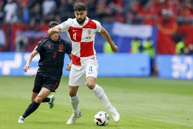 HAMBURG, Volkspark Stadium ,19-06-2024 , European Football Championship Euro2024, Group stage match no.15 between Croatia and Albania, Croatia player Josko Gvardiol and Albania player Jasir Asani Croatia - Albania (Euro2024)  x25532222x Copyright: