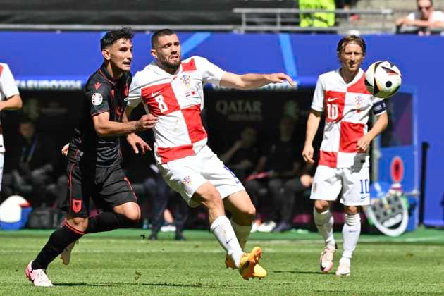 GER, Euro 2024, Group B, Croatia HRV vs Albania ALB 19 06 2024, Volksparkstadion, GER, Euro 2024, Group B, Croatia HRV vs Albania ALB in the picture Mateo Kovacic HRV 08 tries to assert himself against Qazim Laçi ALB 14 nordphotoxGmbH xWitke nph00002