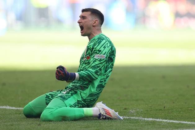 Dominik Livakovic of Croatia celebrates Croatia s second goal Croatia v Albania, UEFA European Championship, EM, Europameisterschaft 2024, Group B, Football, Volksparkstadion, Hamburg, Germany, 19 Jun 2024 EDITORIAL USE ONLY No use with unauthorised audio, video, data, fixture lists, club league logos or live services. Online in-match use limited to 120 images, no video emulation. No use in betting, games or single club league player publications. Copyright: xPaulxCurrie Shutterstockx 14543648bv