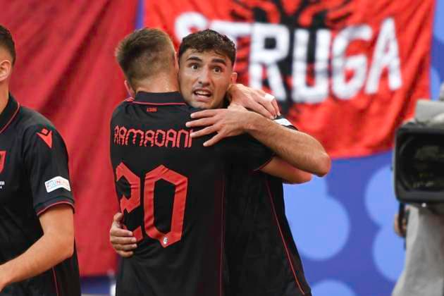 GER, Euro 2024, Group B, Croatia HRV vs Albania ALB 19 06 2024, Volksparkstadion, GER, Euro 2024, Group B, Croatia HRV vs Albania ALB in picture Qazim Laçi ALB 14 shoots the goal to 1 0 for Albania past goalkeeper Dominik Livakovic HRV 01 and cheers with the team nordphotoxGmbH xWitke nph00002