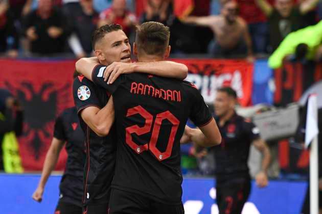 GER, Euro 2024, Group B, Croatia HRV vs Albania ALB 19 06 2024, Volksparkstadion, GER, Euro 2024, Group B, Croatia HRV vs Albania ALB in picture Qazim Laçi ALB 14 shoots the goal to 1 0 for Albania past goalkeeper Dominik Livakovic HRV 01 and cheers with the team nordphotoxGmbH xWitke nph00002