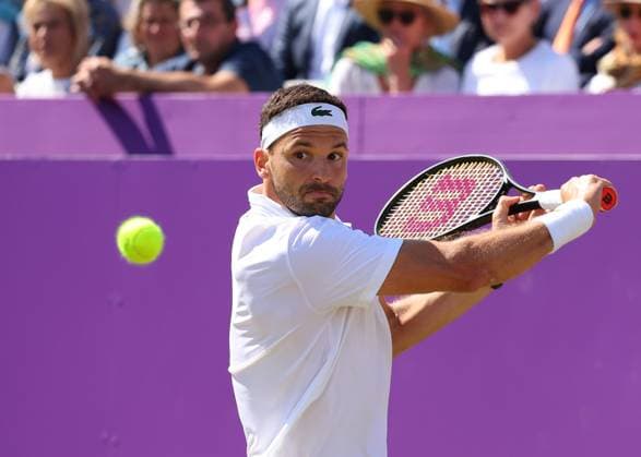 19th June 2024; Cinch Championships, Queens Club, West Kensington, London, England: Cinch Championships Queens Club, Day 3; Grigor Dimitrov (BUL) with a backhand shot to Sebastian Korda (USA), mens singles match  ActionPlus12656798 JohnxPatrickxFletcher