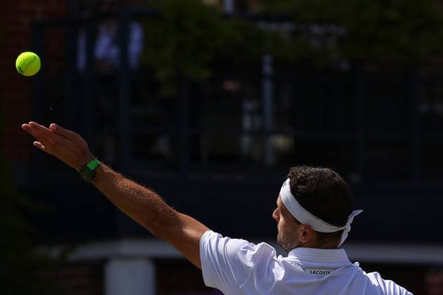 19th June 2024; Cinch Championships, Queens Club, West Kensington, London, England: Cinch Championships Queens Club, Day 3; Grigor Dimitrov (BUL) serves to Sebastian Korda (USA), mens singles match  ActionPlus12656802 JohnxPatrickxFletcher