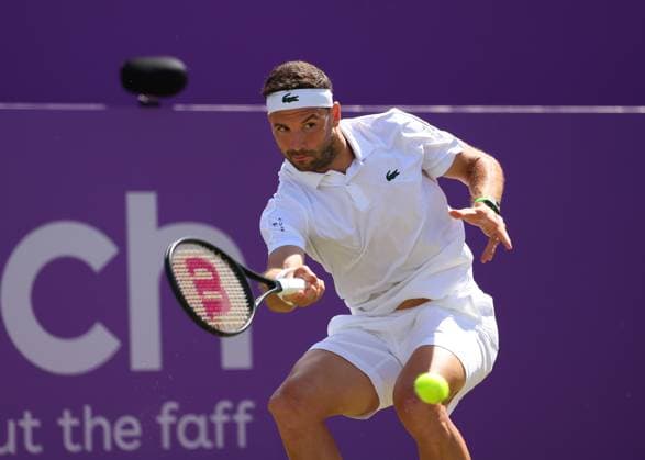 19th June 2024; Cinch Championships, Queens Club, West Kensington, London, England: Cinch Championships Queens Club, Day 3; Grigor Dimitrov (BUL) with a forehand shot to Sebastian Korda (USA), mens singles match  ActionPlus12656808 JohnxPatrickxFletcher