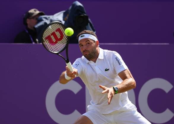 19th June 2024; Cinch Championships, Queens Club, West Kensington, London, England: Cinch Championships Queens Club, Day 3; Grigor Dimitrov (BUL) with a forehand shot to Sebastian Korda (USA), mens singles match  ActionPlus12656810 JohnxPatrickxFletcher