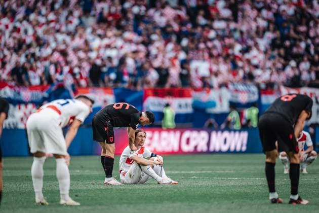 Soccer Men UEFA European Football Championship 2024 Group B Croatia vs Albania 19 06 2024 v l Arber Hoxha 26, Albania tries to cheer up Luka Modric 10, Croatia after the match Hamburg Volksparkstadion Hamburg Germany