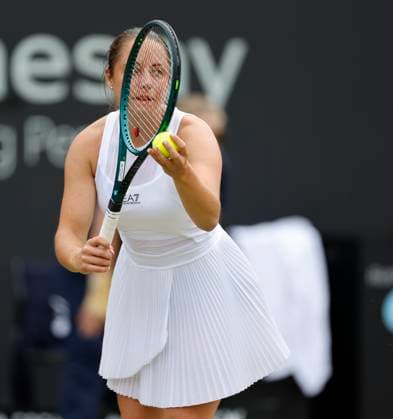 19th June 2024; Edgbaston Priory Club, Birmingham, England: Rothesay Tennis Classic Birmingham, Day 3; Elizabetta Cocciaretto (ITA) framed by her racket in her womens singles match against Sloane Stephens (USA)  ActionPlus12656827 RogerxEvans