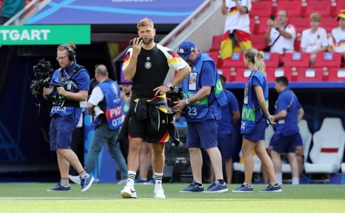 Niclas Füllkrug on the phone Single image Crop action Sport Football Soccer European Championship Euro 2024 European Championship Men Season 2023 2024 19 06 2024 Germany GER vs Hungary HUN in Stuttgart DFL regulations prohibit any use of photographs as image sequences and or quasi video