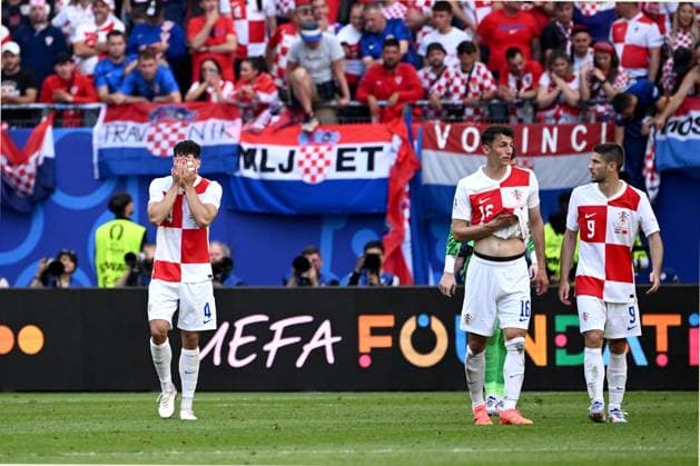 Croatia v Albania: Group B - UEFA EURO, EM, Europameisterschaft,Fussball 2024 HAMBURG, GERMANY - JUNE 19: Josko Gvardiol of Croatia, Ante Budimir of Croatia and Andrej Kramaric of Croatia reacts after the UEFA EURO 2024 group stage match between Croatia and Albania at Volksparkstadion on June 19, 2024 in Hamburg, Germany. MarkoxLukunic PIXSELL