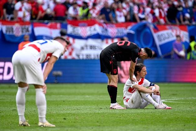 Croatia v Albania: Group B - UEFA EURO, EM, Europameisterschaft,Fussball 2024 HAMBURG, GERMANY - JUNE 19: Arber Hoxha of Albania consoles Luka Modric of Croatia after the UEFA EURO 2024 group stage match between Croatia and Albania at Volksparkstadion on June 19, 2024 in Hamburg, Germany. MarkoxLukunic PIXSELL