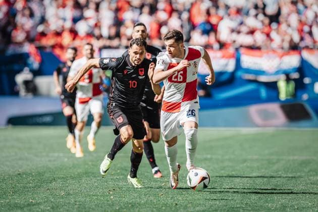 Soccer Men UEFA European Football Championship 2024 Group B Croatia v Albania 19 06 2024 v l Nedim Bajrami 10, Albania and Martin Baturina 26, Croatia Hamburg Volksparkstadion Hamburg Germany