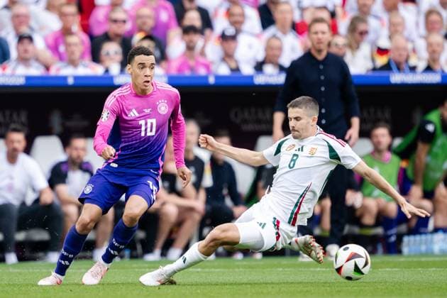 240619 Jamal Musiala of Germany and Adam Nagy of Hungary during the UEFA Euro 2024 Football Championship match between Germany and Hungary on June 19, 2024 in Stuttgart Photo Jesper Zerman BILDBYRAN kod JZ JZ0542 fotboll football soccer fotballs em europamästerskap em uefa euro uefa european football championship euro 2024 tyskland germany hungary bbeng  Copyright: JESPERxZERMAN BB240619JZ039
