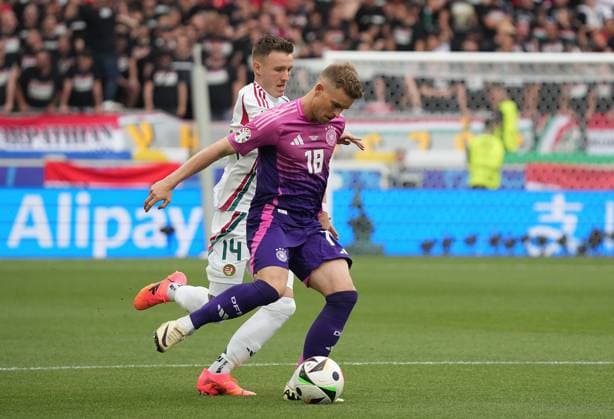 19 06 2024, Stuttgart Arena, Stuttgart, GER, EM UEFA 2024, Group A, Germany vs Hungary, in the picture Maximilian Mittelstädt Germany , Bendeguz Bolla Hungary Defodi 506 20240619 hbr 1595 Defodi-506