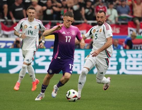 19 06 2024, Stuttgart Arena, Stuttgart, GER, EM UEFA 2024, Group A, Germany vs Hungary, in the picture Florian Wirtz Germany , Attila Fiola Hungary Defodi 506 20240619 hbr 1650 Defodi-506