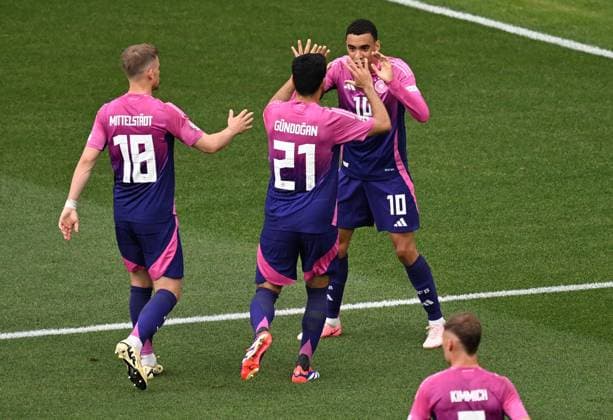 19 06 2024, xjhx, European Football Championship 2024, Germany Hungary emspor, v l Maximilian Mittelstädt German national football team DFB , Ilkay Gündogan German national football team DFB , Jamal Musiala German national football team DFB celebrate the goal, Der Torjubel zum 1 0 UEFA REGULATIONS PROHIBIT ANY USE OF PHOTOGRAPHS as IMAGE SEQUENCES and or QUASI VIDEO Stuttgart