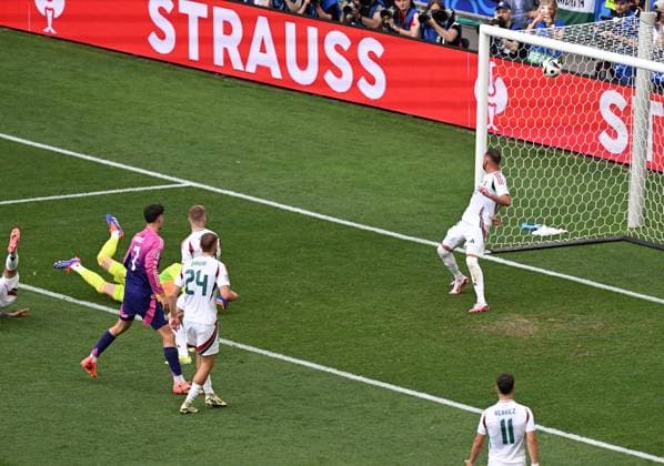 19 06 2024, xjhx, Football EM 2024, Germany Hungary emspor, v l Jamal Musiala Deutsche Fussball Nationalmannschaft DFB , Peter Gulacsi Hungary Goal scored, erziehlt das Tor zum 1 0 UEFA REGULATIONS PROHIBIT ANY USE OF PHOTOGRAPHS as IMAGE SEQUENCES and or QUASI VIDEO Stuttgart