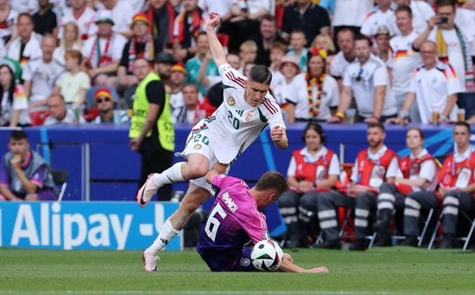 Roland Sallai, Joshua Kimmich duel Match scene Action Sport Football Soccer European Championship Euro 2024 European Championship Men Season 2023 2024 19 06 2024 Germany GER vs Hungary HUN in Stuttgart DFL regulations prohibit any use of photographs as image sequences and or quasi video
