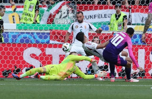 Jamal Musiala scores the 1-0 goal against goalkeeper Peter Gulacsi Sport Football Soccer European Championship Euro 2024 European Championship Men Season 2023 2024 19 06 2024 Germany GER vs Hungary HUN in Stuttgart DFL regulations prohibit any use of photographs as image sequences and or quasi video