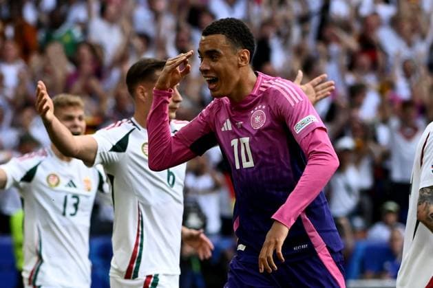 19 06 2024, xpsx, European Football Championship 2024, Germany Hungary emspor, v l Goal celebration after the goal celebrating the goal celebrate 1 0 by Jamal Musiala German national football team DFB DFL DFB REGULATIONS PROHIBIT ANY USE OF PHOTOGRAPHS as IMAGE SEQUENCES and or QUASI VIDEO Stuttgart