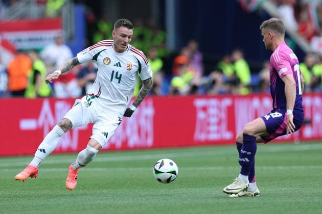 Soccer UEFA EURO 2024 group stage 2 matchday Germany Hungary on 19 06 2024 at Stuttgart Arena in Stuttgart Bendeguz Bolla Hungary , left Maximilian Mittelstädt Germany , right xMSx
