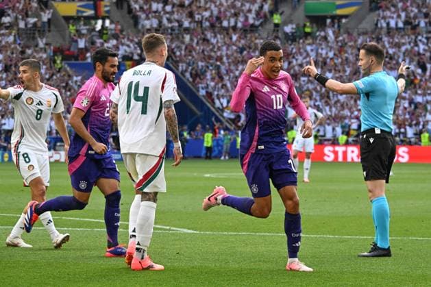 19 06 2024, xsltx, Football EM 2024, Germany Hungary emspor, v l Jamal Musiala Germany, 10 Jubel, Torjubel, jubelt ueber das Tor, celebrate the goal, celebration DFL DFB REGULATIONS PROHIBIT ANY USE OF PHOTOGRAPHS as IMAGE SEQUENCES and or QUASI VIDEO Stuttgart