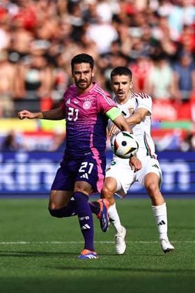 Ilkay Gündogan of Germany and Ãdam Nagy of Hungary Germany v Hungary, UEFA European Championship, EM, Europameisterschaft 2024, Group A, Football, Stuttgart Arena, Stuttgart, Germany, 19 Jun 2024 EDITORIAL USE ONLY No use with unauthorised audio, video, data, fixture lists, club league logos or live services. Online in-match use limited to 120 images, no video emulation. No use in betting, games or single club league player publications. Copyright: xMichaelxZemanek Shutterstockx 14543652ax