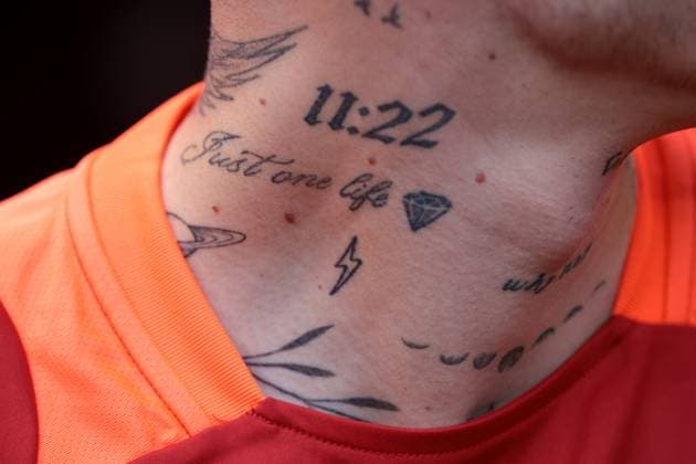 Cologne, Germany, 15th June 2024. Tattoos on the neck of Hungary substitutes prior to the UEFA European Championships match at Cologne Stadium, Cologne. Picture credit should read: Jonathan Moscrop Sportimage EDITORIAL USE ONLY. No use with unauthorised audio, video, data, fixture lists, club league logos or live services. Online in-match use limited to 120 images, no video emulation. No use in betting, games or single club league player publications. SPI-3181-0073